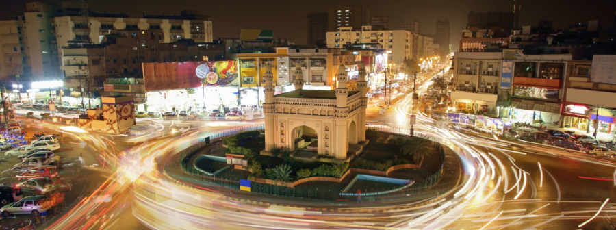 People in Karachi, Pakistan going about their lives at night.